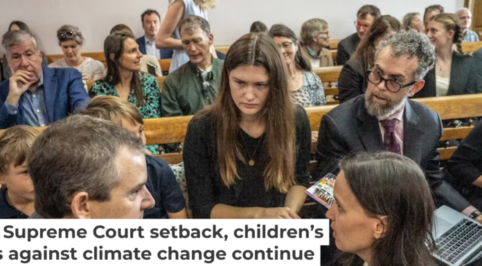 Young Montanans, including Rikki Held, center, sued their state government and won a key ruling forcing the state government to consider greenhouse gas emissions when reviewing proposed development projects. William Campbell/Getty Images